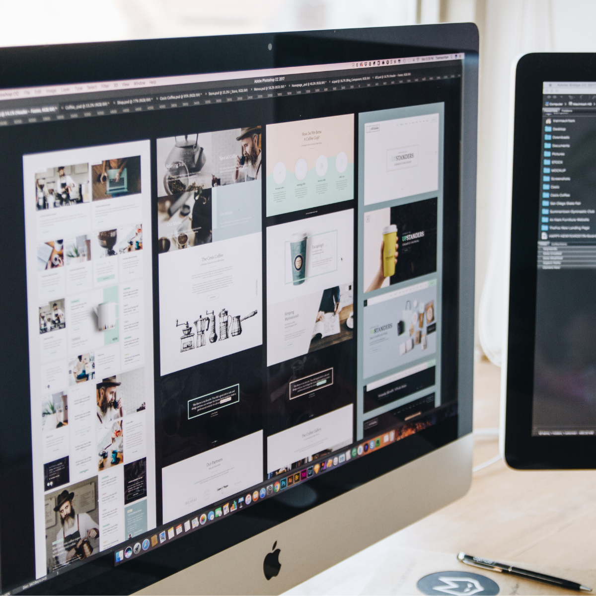 Designer working on website page mockups in Photoshop